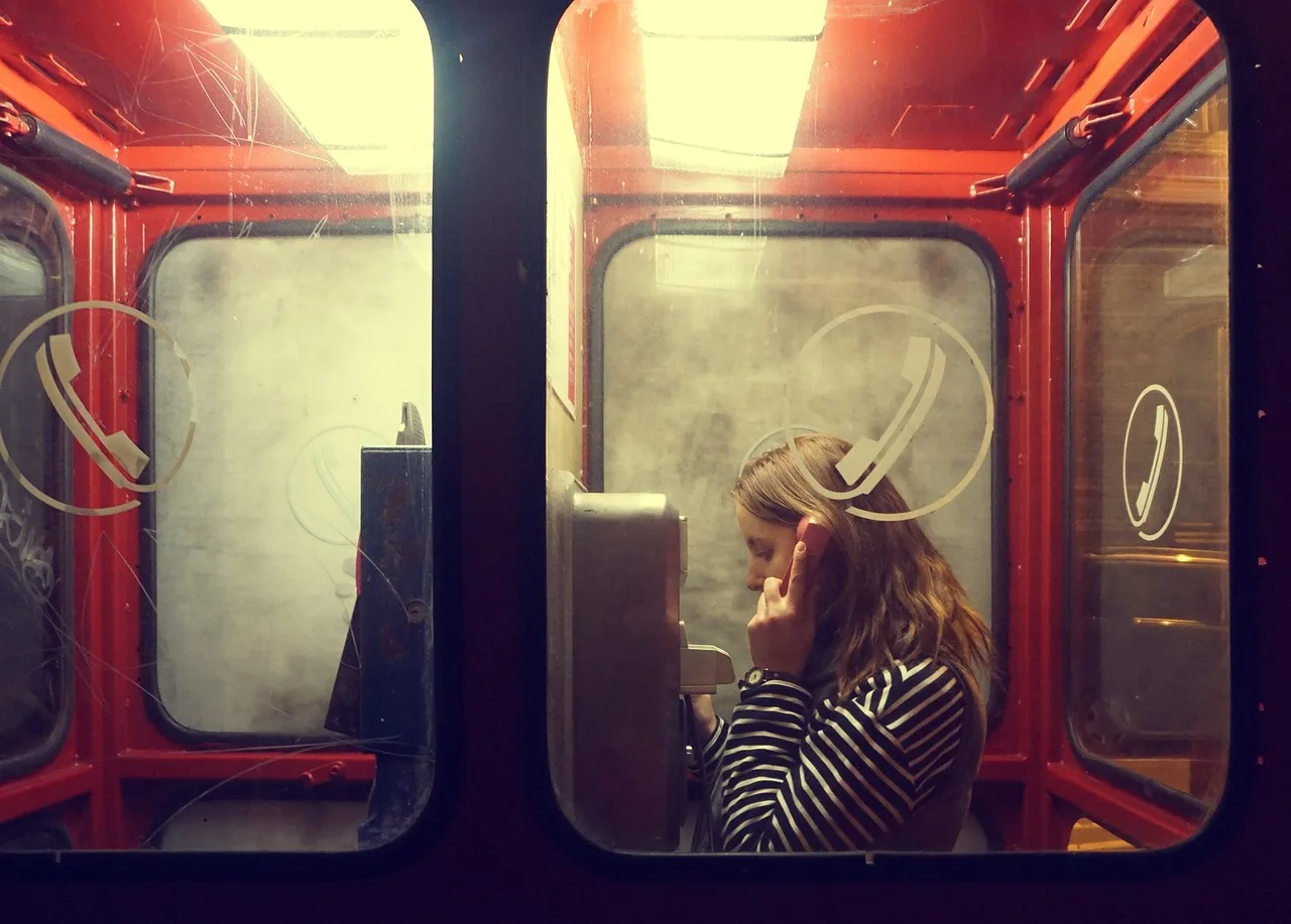 budapest, girl, girl talking, hungary, phone, phone booth, phone box, retro, sad girl, woman, woman talking, vintage, budapest, phone booth, phone booth, phone booth, phone booth, phone booth, phone box, sad girl, sad girl. Open Air vs Enclosed Photo Booth: Which Rental Is Better?
