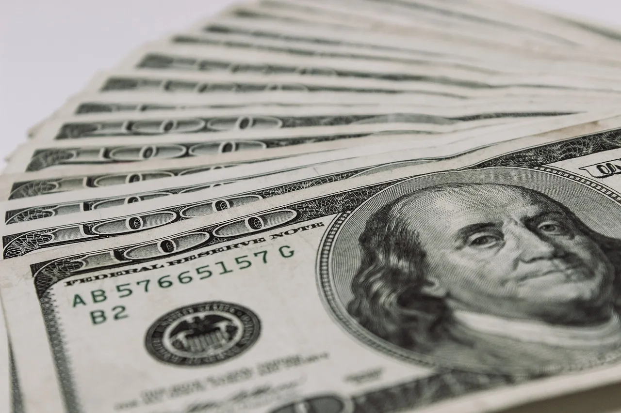 money, currency, business, finance, bills, 100, gray business, gray money, gray finance, gray company, money, money, money, money, money, currency, business. Cross-border bookings when US planners hire a Canadian booth operator