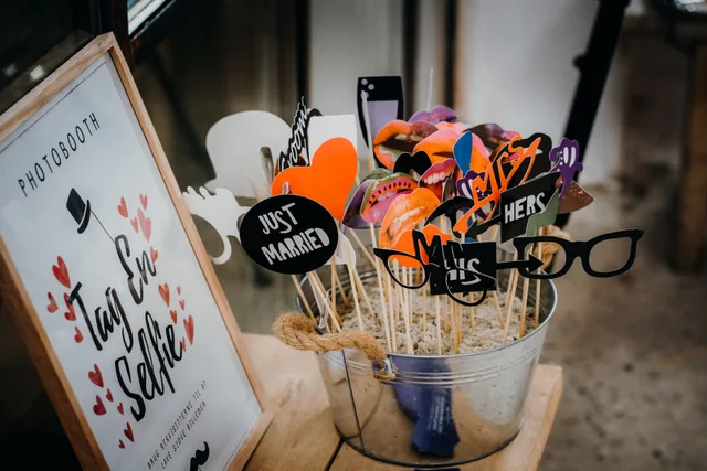Creative wedding photobooth props with fun designs like glasses and moustaches. Photo booth rental software: tools and metrics